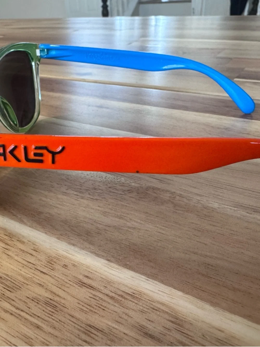 2 Oakley style kids Sunglasses polarized lenses. Not sure if authentic NWT